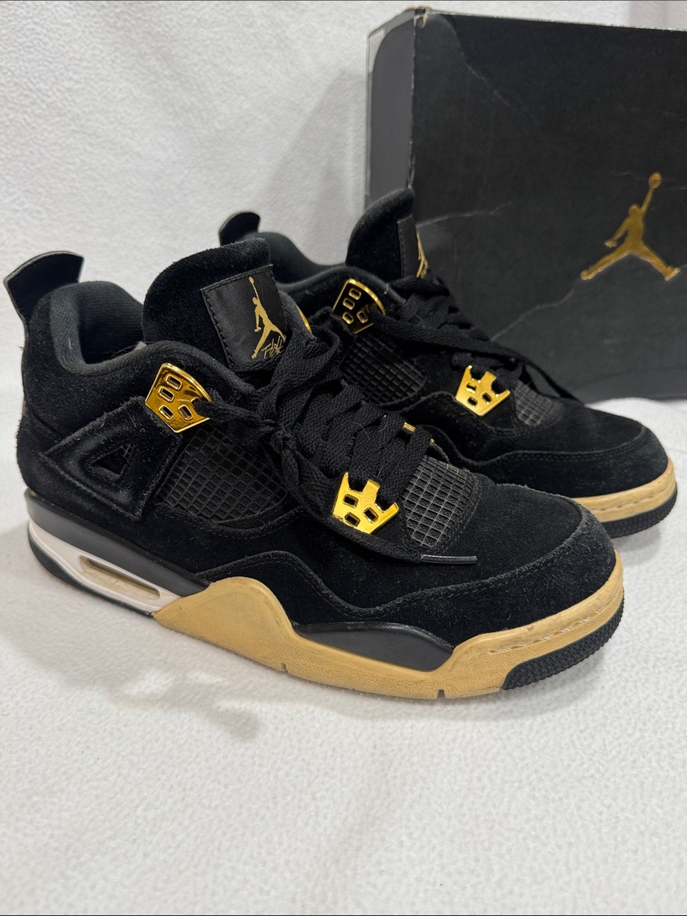 Jordan Black and Gold Sneakers